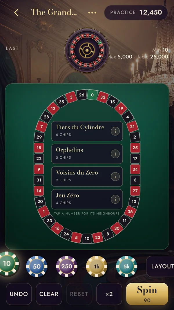 The racetrack in the Grand Salon: the wheel's numbers in order around an oval, with Tiers du Cylindre, Orphelins, Voisins du Zéro and Jeu Zéro buttons and their chip counts