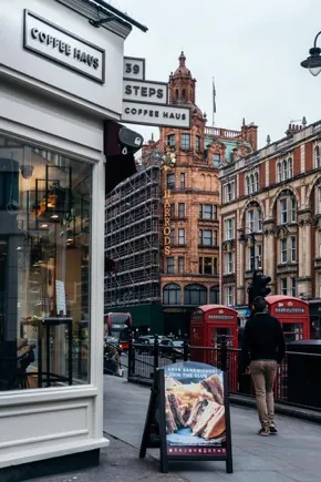 39 Steps Coffee Haus sign and pavement A-board, Knightsbridge, London