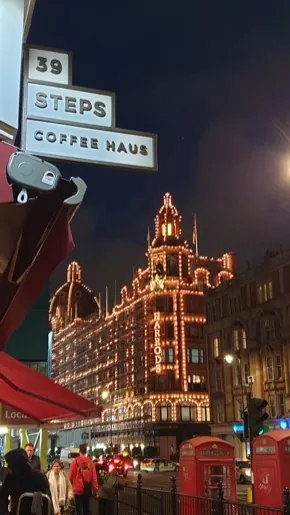 39 Steps Coffee Haus sign at night, Knightsbridge, London